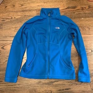 Blue north face running jacket in medium
